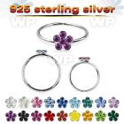 silver seamless nose hoop w crystals flower in the middle 